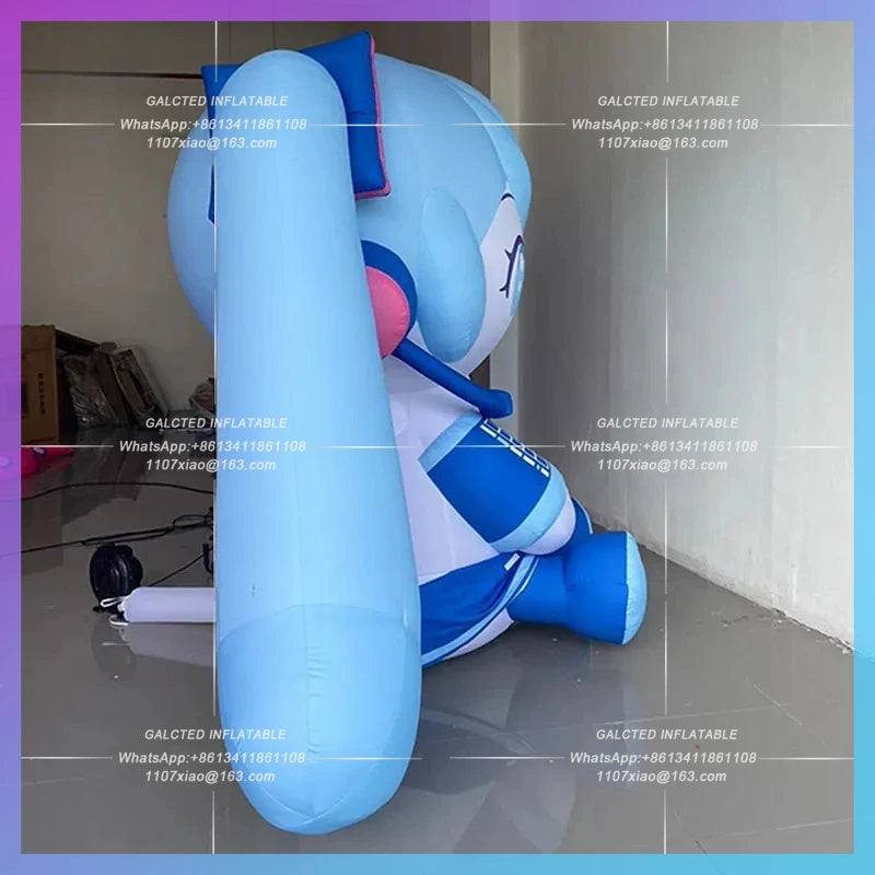 blue long hair double ponytail Inflatable seated blue anime girl model concert stage ambience lighting arrangement