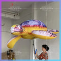 man carries the Money Receipt Fund Ocean The inflatable sea turtle model Park Bar boss walking patrol field interactive prop