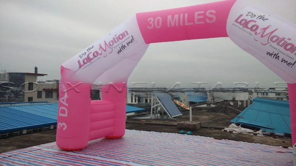 white and pink inflatable race event arch with logo for important activities