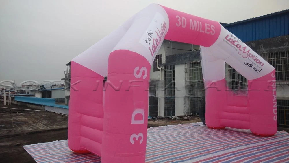 white and pink inflatable race event arch with logo for important activities